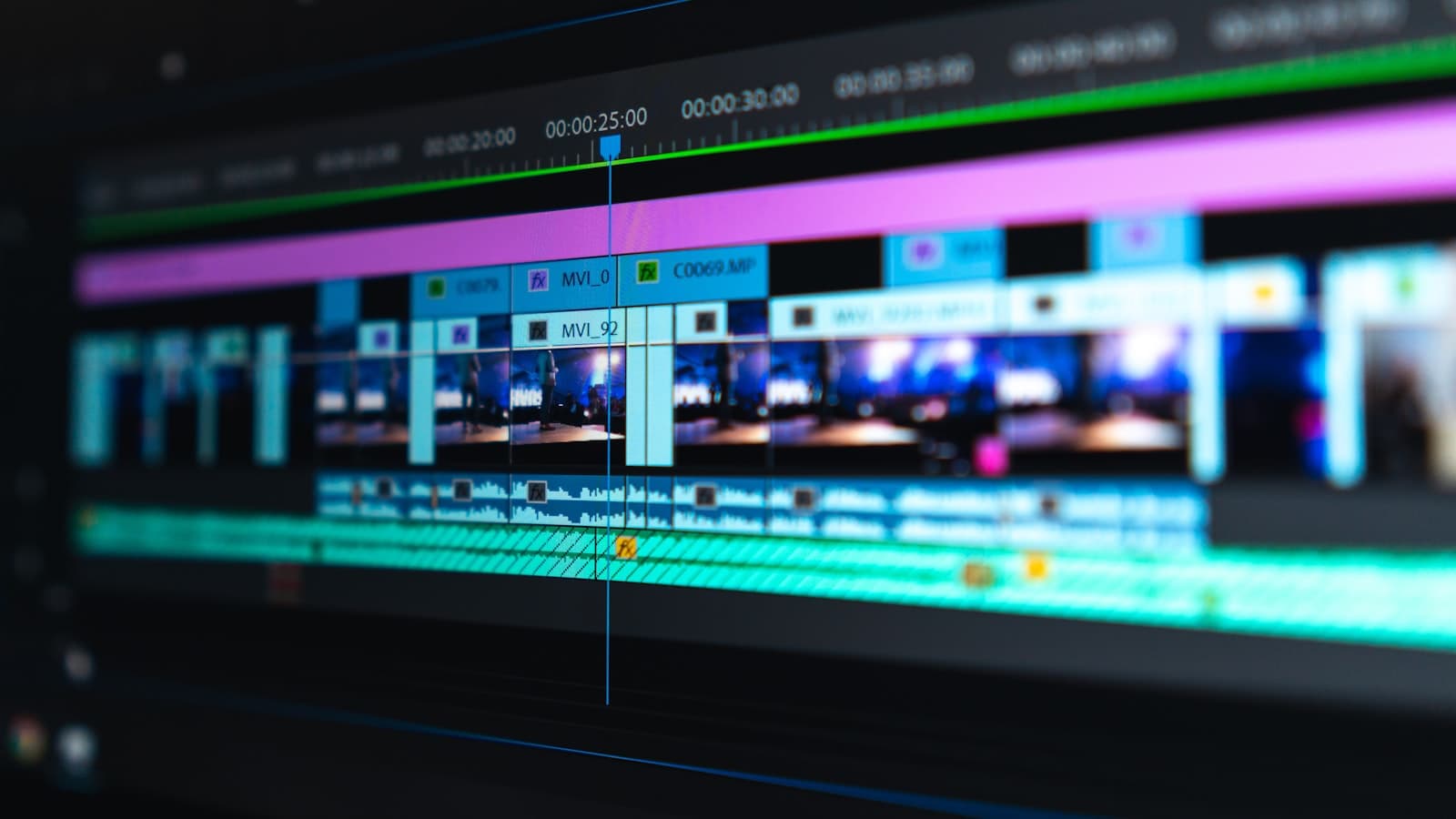 A camera lens beside thumbnail design for a YouTube live stream