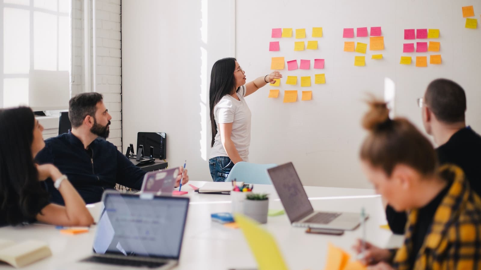 A team planning a content calendar for a 24/7 stream
